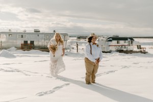 First look between two brides Retro Camper Elopement at Hotel Luna Mystica in Taos New Mexico