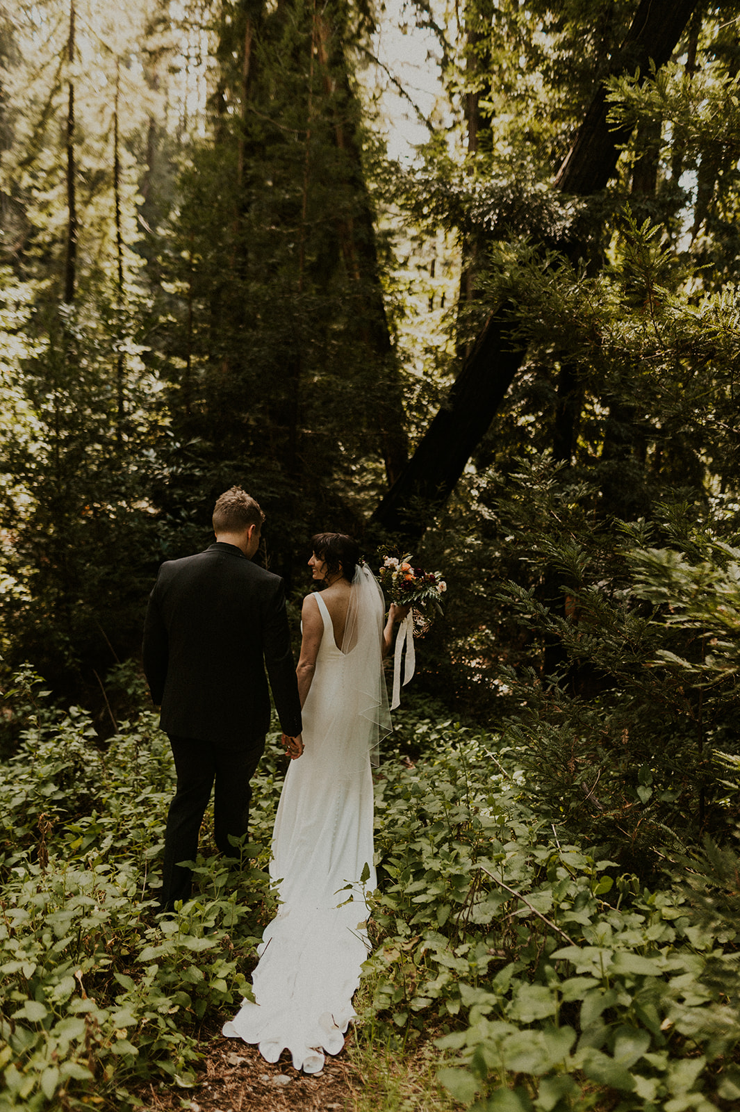Portrait of bride and groom in the Redwoods at the Alila Ventana Big Sur