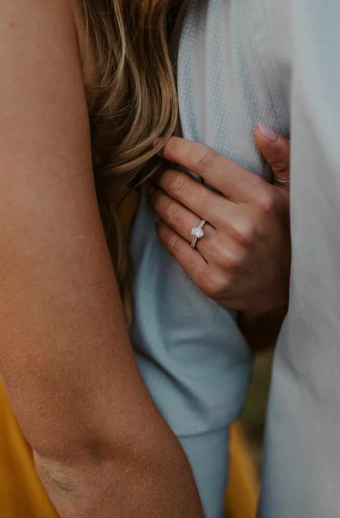 Detail shot of bride's engagement ring during engagement photos 