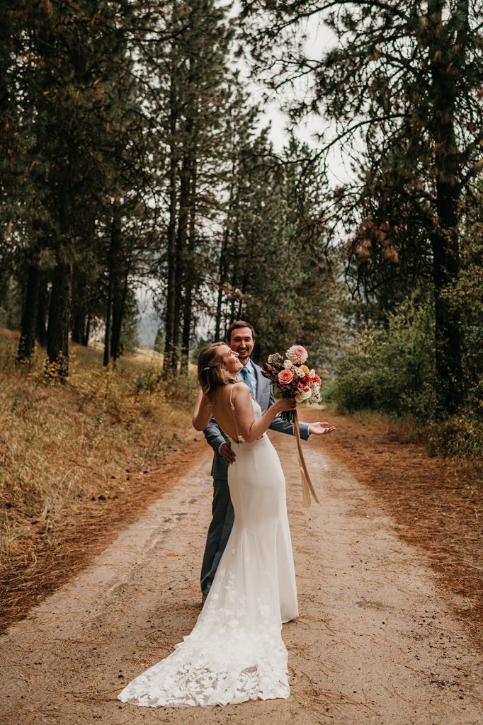 bride and groom share a first look in the mountains of Idaho