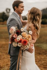 Romantic Fall wedding bouquet with warm accent colors