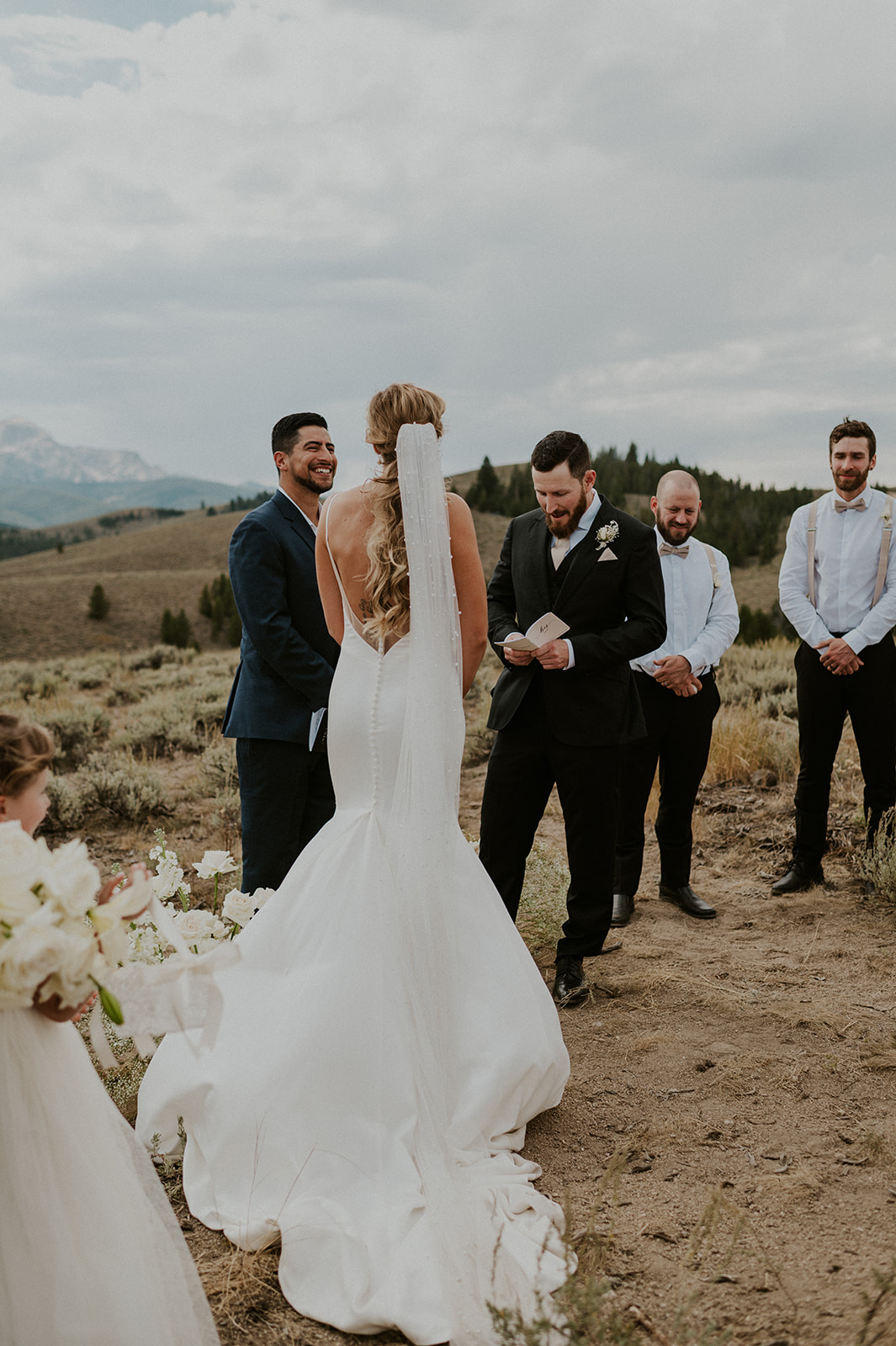 bride and groom share their intimate vows during their elopement in the Sawtooth mountains outside Stanley, Idaho