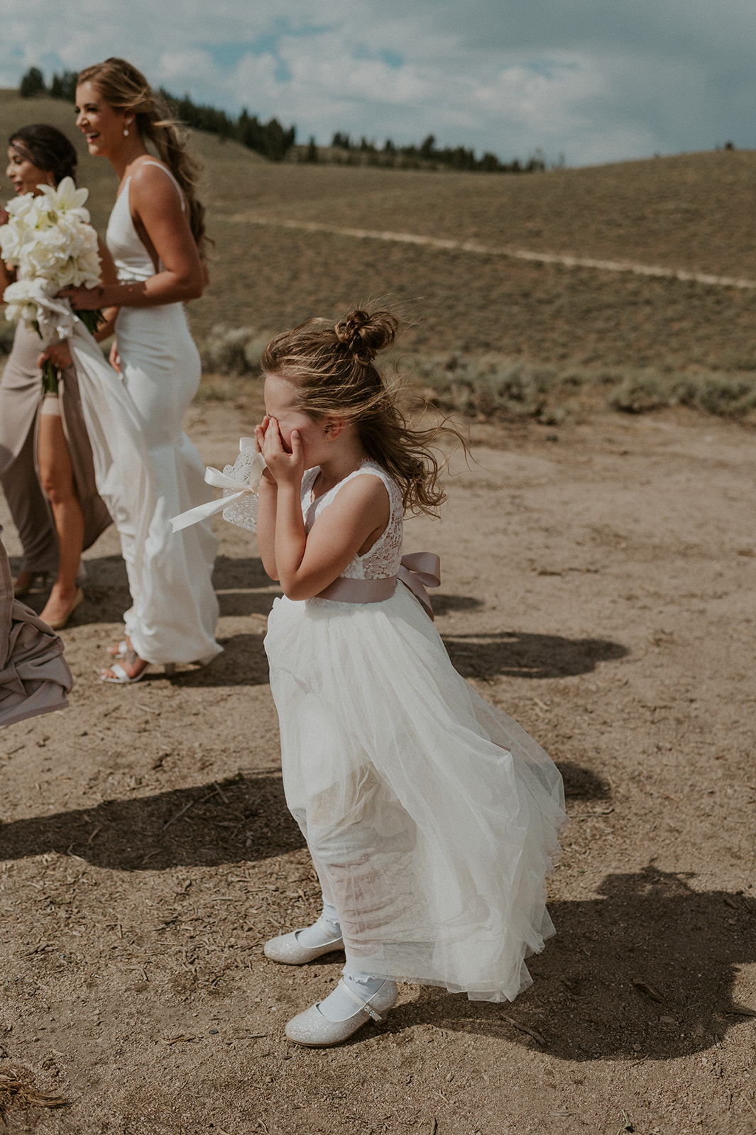 Candid moment of flower girl in the Sawtooths