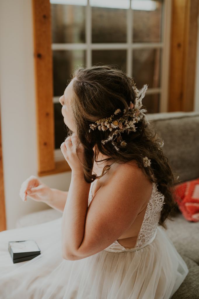 Boho Bride with Flowers Cascading down her dark curly hair