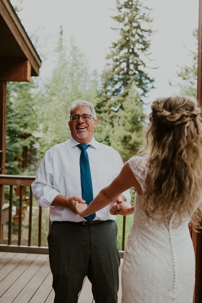 Bride shares first look with her dad on her wedding day in McCall Idaho