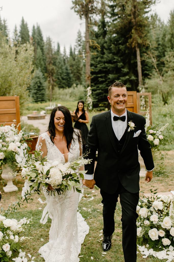 Bride and Groom Walking Down the Aisle after their First Kiss Recessional