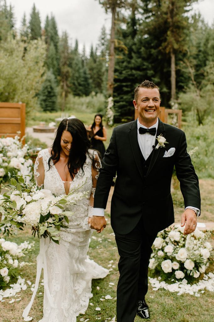 Bride and Groom Walking Down the Aisle after their First Kiss Recessional