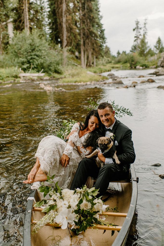 Bride and Groom Portraits in a Canoe on the River