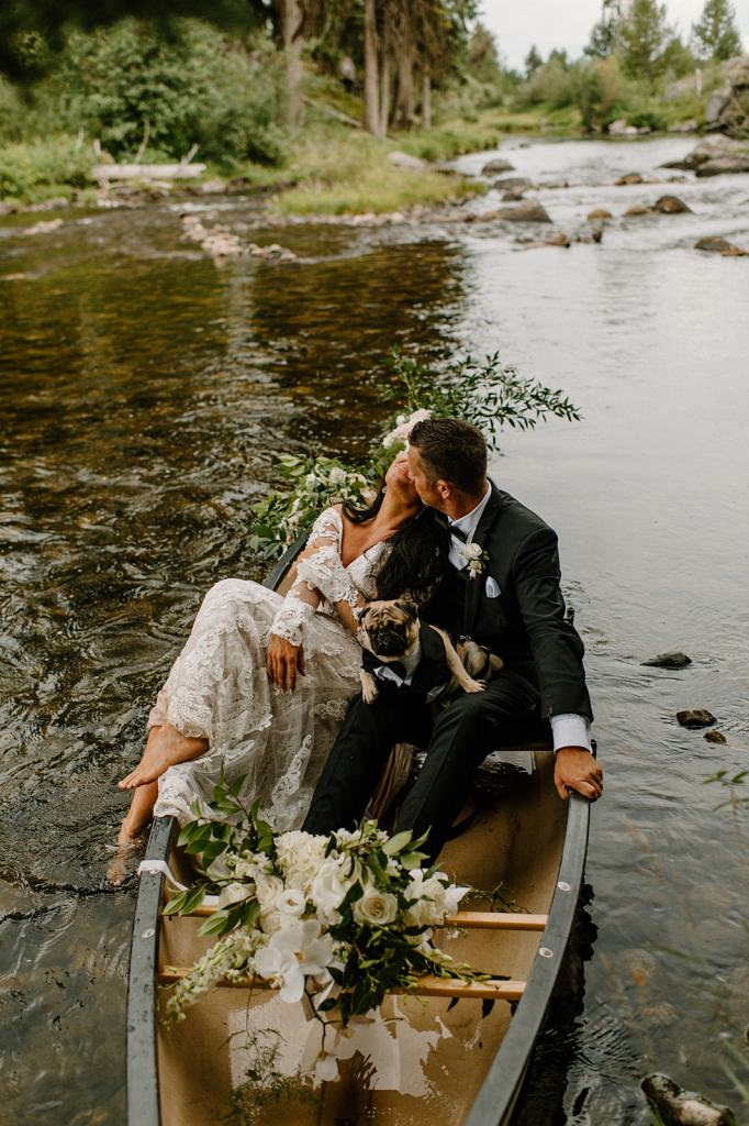Bride and Groom Portraits in a Canoe on the River
