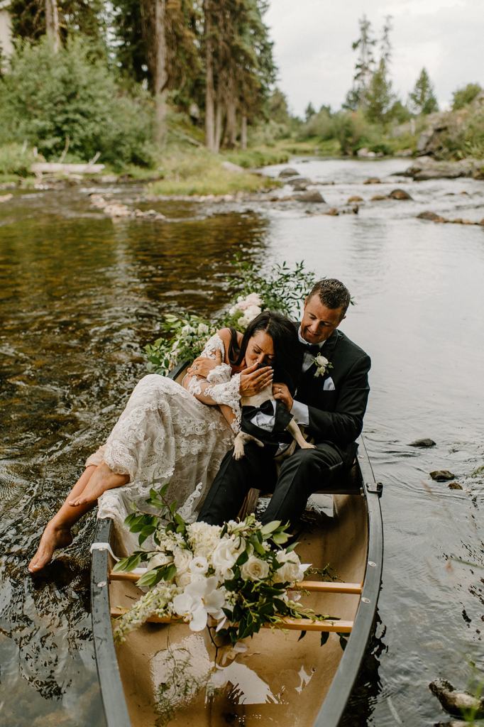 Bride and Groom Portraits in a Canoe on the River