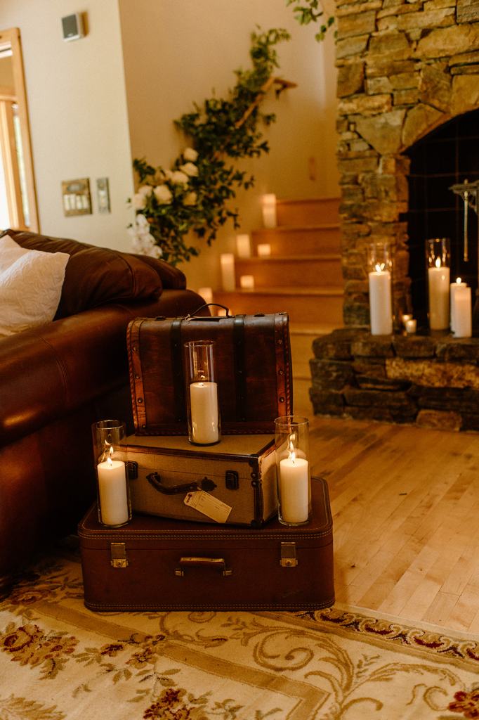 Flower Covered Fireplace Wedding Reception Decor with Candles