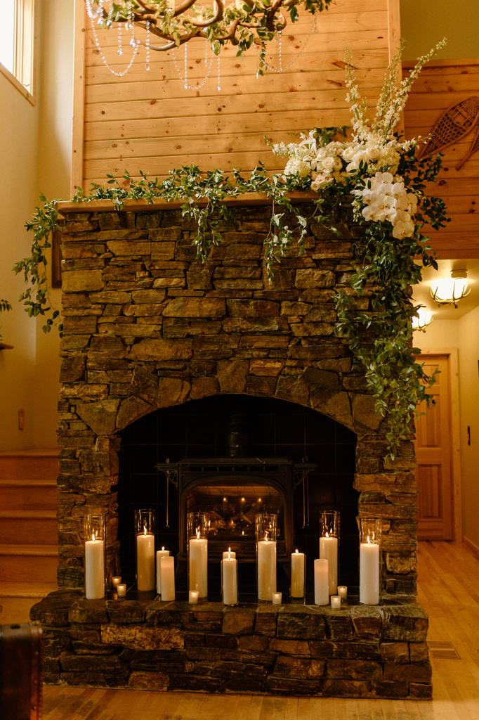 Flower Covered Fireplace Wedding Reception Decor